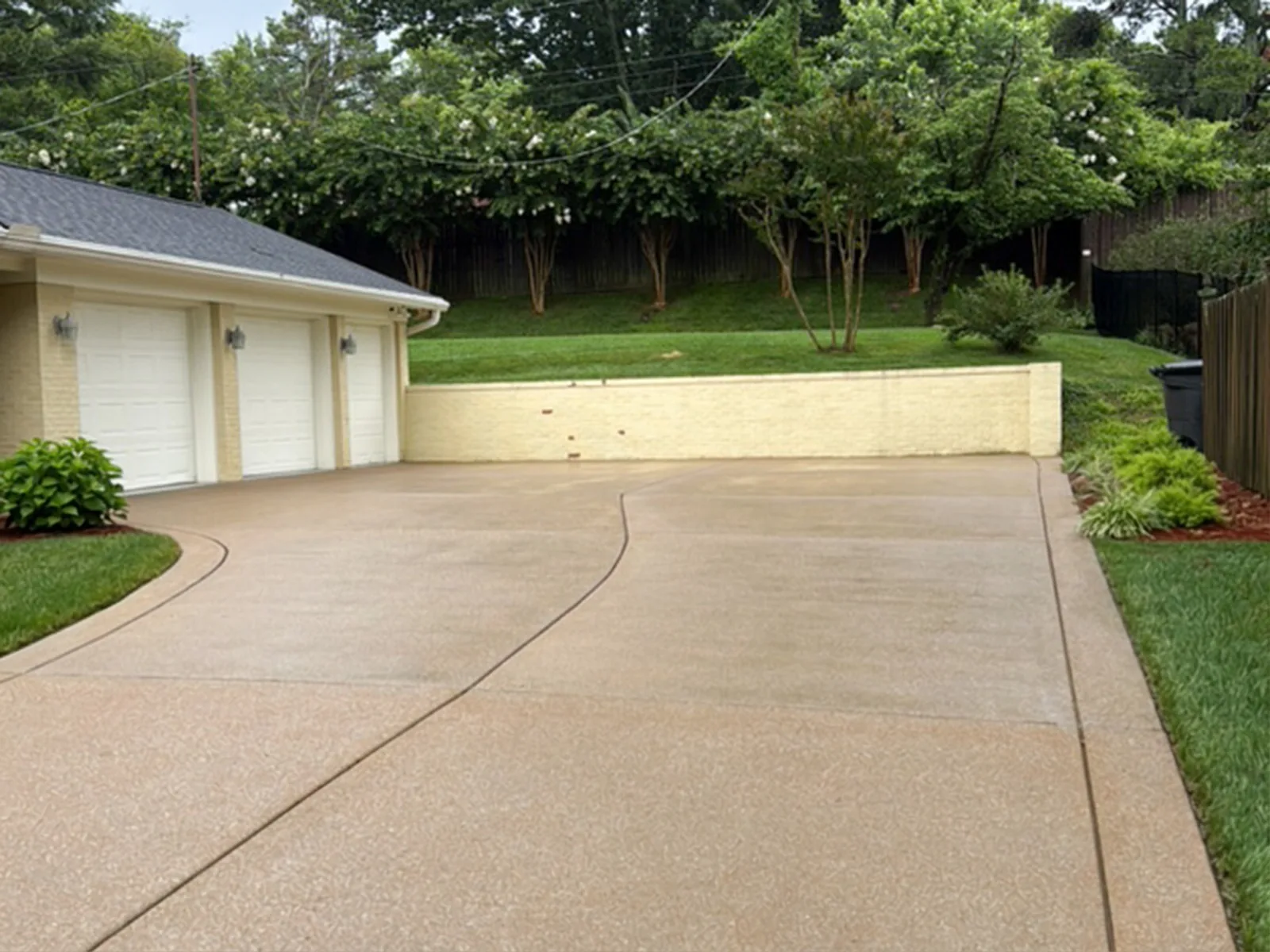 Aggregate driveway washed clean — after professional cleaning in Brentwood, TN
