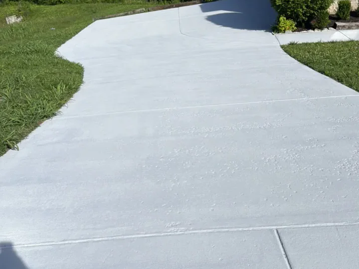 Concrete driveway cleaned and sealed — after professional cleaning in Franklin, TN