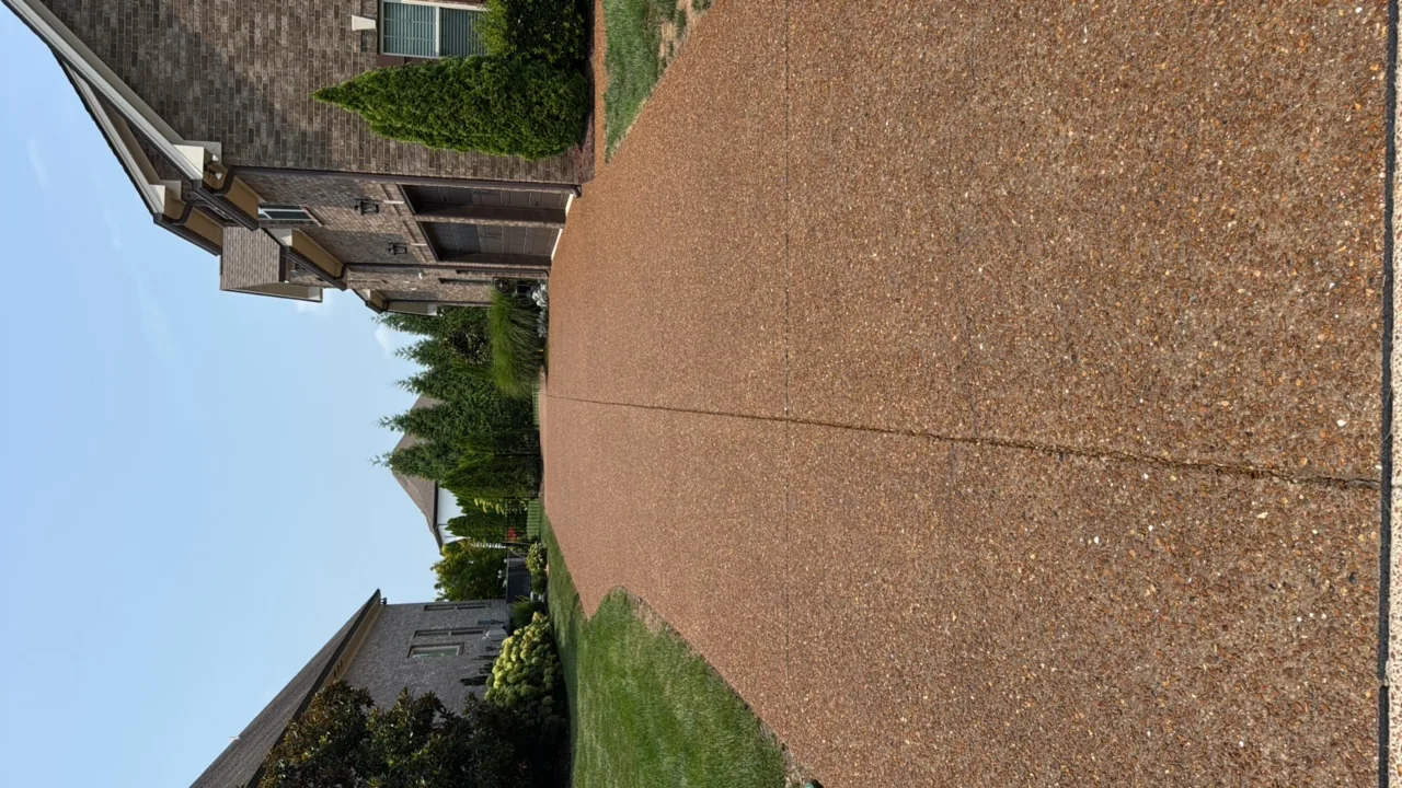 Exposed aggregate driveway cleaned and sealed — after professional cleaning in Franklin, TN